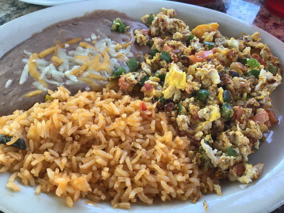 Mexico Mi Amor offers Huevos a la Mexicana as a lunch special. It’s scrambled eggs mixed with onion, tomato and fresh pickled jalapeno, served with rice and beans.