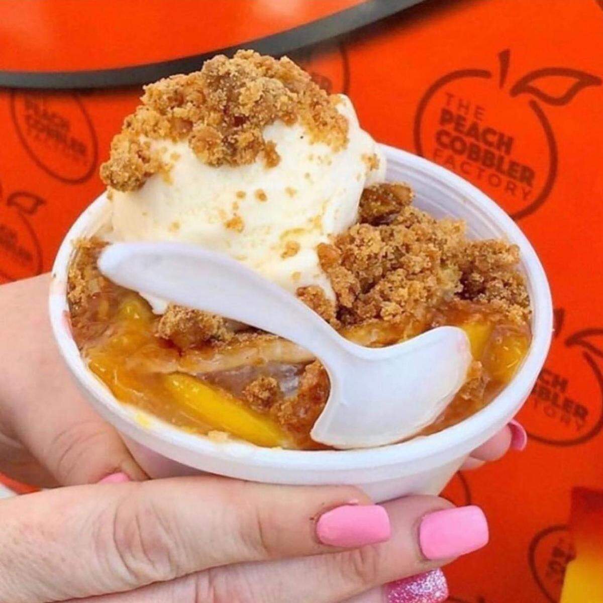 The Peach Cobbler Factory offers a dozen kinds of cobbler and you can also get cobbler filling “stuffed” into a cinnamon roll.