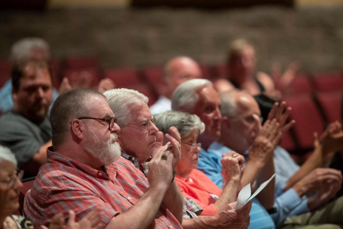 People applaud after a resident spoke against a proposal to change zoning to allow Buffalo Trace Distillery to construct warehouses on what was formerly classified as agricultural land during an Anderson County Fiscal Court on Tuesday, July 19, 2022.