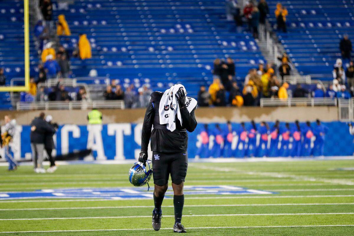 Kentucky defensive lineman Deone Walker walks off the field after his team’s loss to Missouri at Kroger Field.