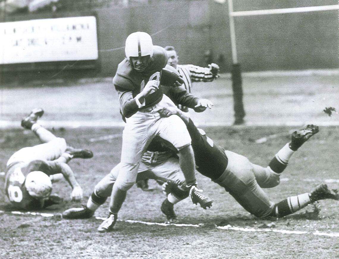 Kentucky’s Jim Howe returned the opening kickoff of the Great Lakes Bowl to the 15-yard line before being brought down by Villanova’s Ed Berrang and John Sandusky.
