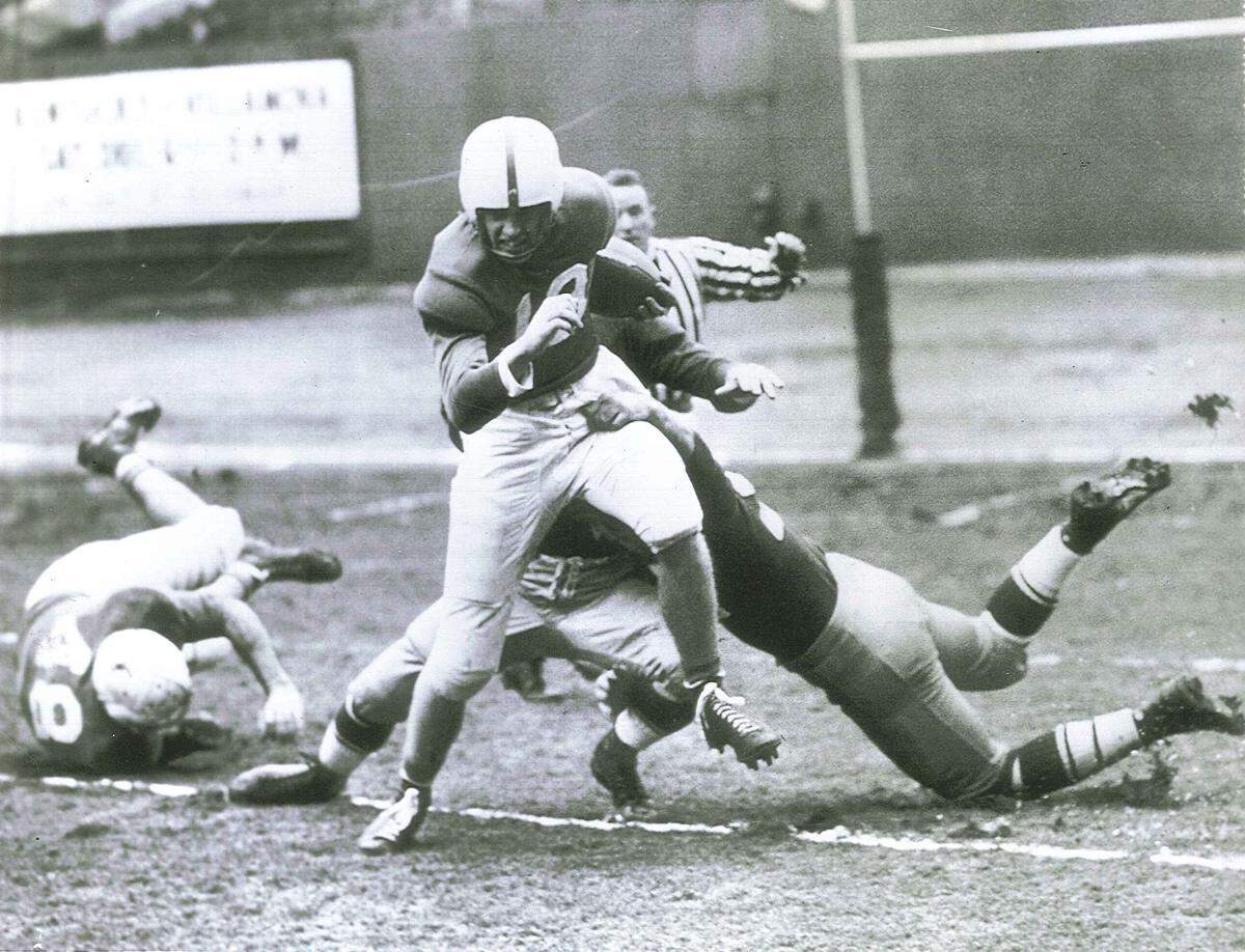 Kentucky’s Jim Howe returned the opening kickoff of the Great Lakes Bowl to the 15-yard line before being brought down by Villanova’s Ed Berrang and John Sandusky.