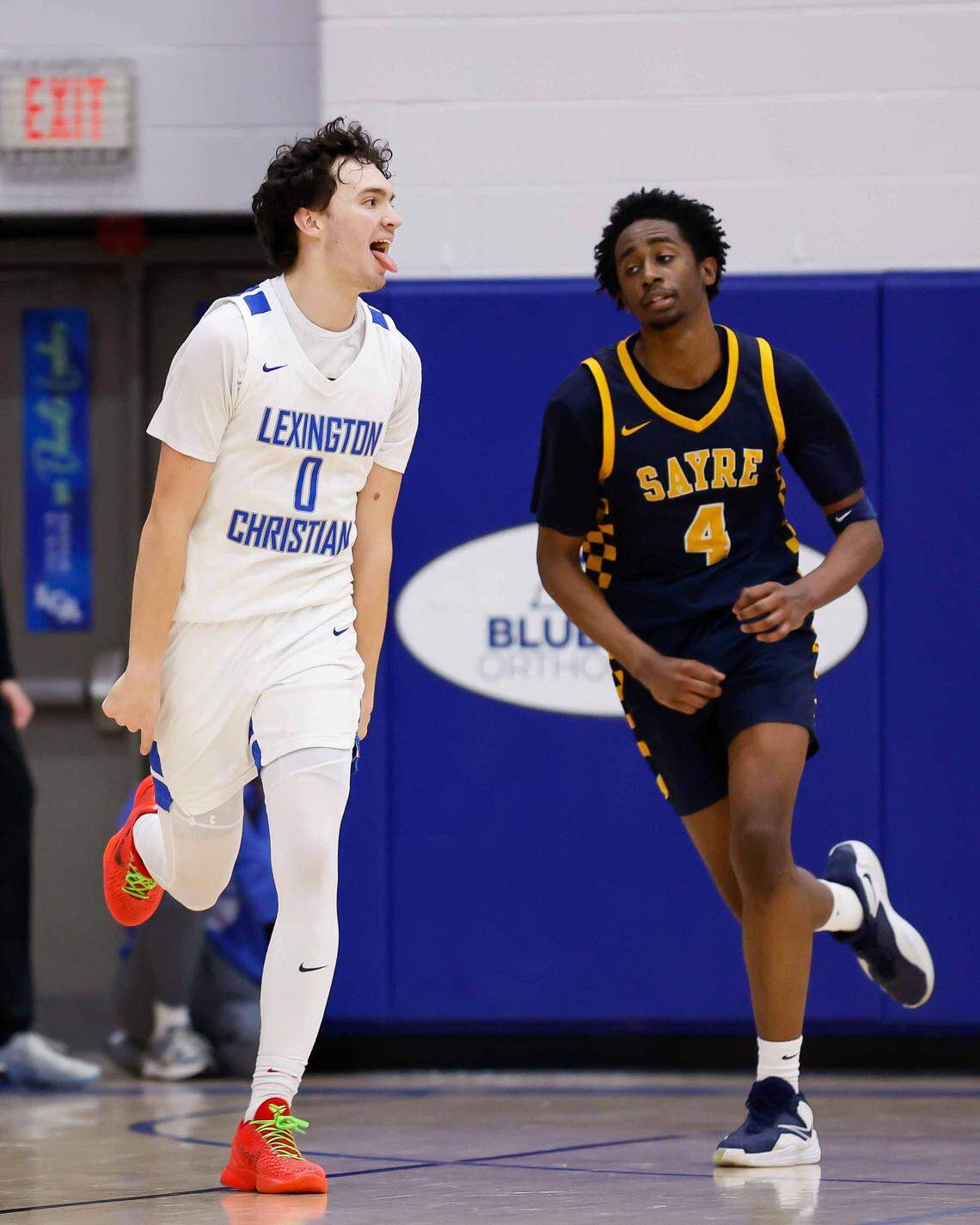 Lexington Christian's Dawson Farmer (0) celebrates after a three point shot during a high school boys basketball game, on Saturday, Jan. 17, 2026.