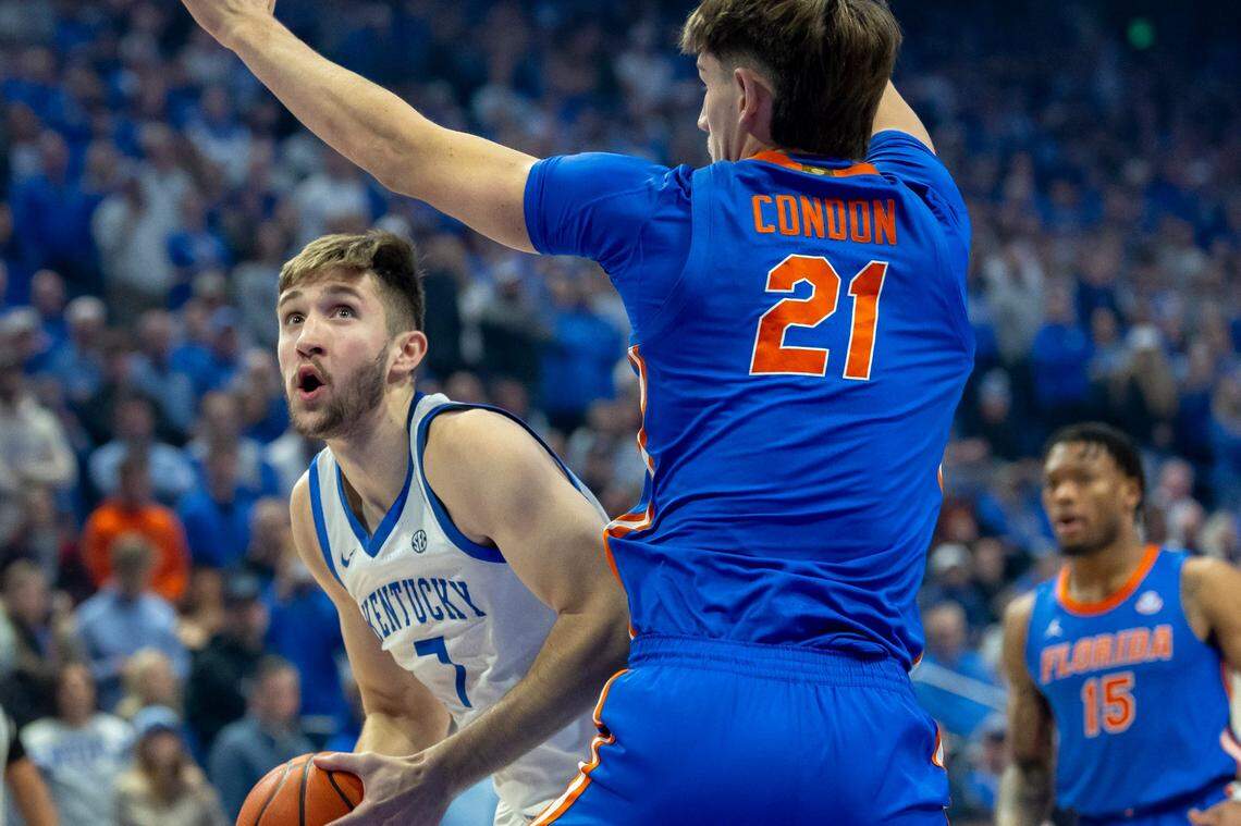 Kentucky Wildcats forward Andrew Carr (7) looks to shoot as Florida Gators forward Alex Condon (21) defends during a game at Rupp Arena on Saturday, Jan. 4, 2025.