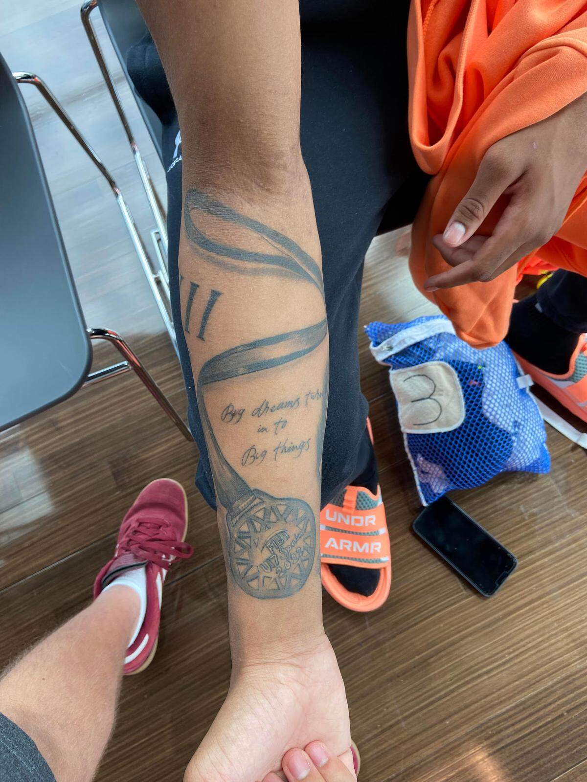 Class of 2024 point guard and Kentucky men’s basketball recruit Boogie Fland shows a tattoo on his right forearm commemorating the gold medal he won with the United States at the FIBA U-17 Basketball World Cup in Spain. In August, Fland spoke to the Herald-Leader while in Chicago for the Under Armour Next Elite 24 event.