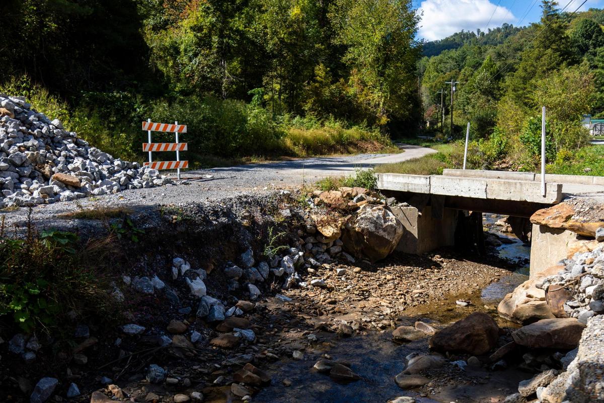 Signs of construction can still be seen around a creek that feeds into Wallins Creek, Ky., Friday, October 2, 2020. A Blackjewel strip mine in the hills behind Wallins Creek has not been reclaimed by the company causing environmental issues with the creek and surrounding area. With heavy rain the creek has flooded after water builds up in abandon mineshaft in the hills destroying bridges that people in the area use daily.