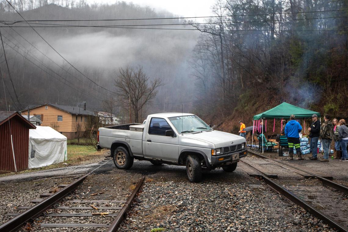 Miners, who say they haven’t been paid in three weeks, block a coal train in Pike County, Ky., Tuesday, Jan. 14, 2020.
