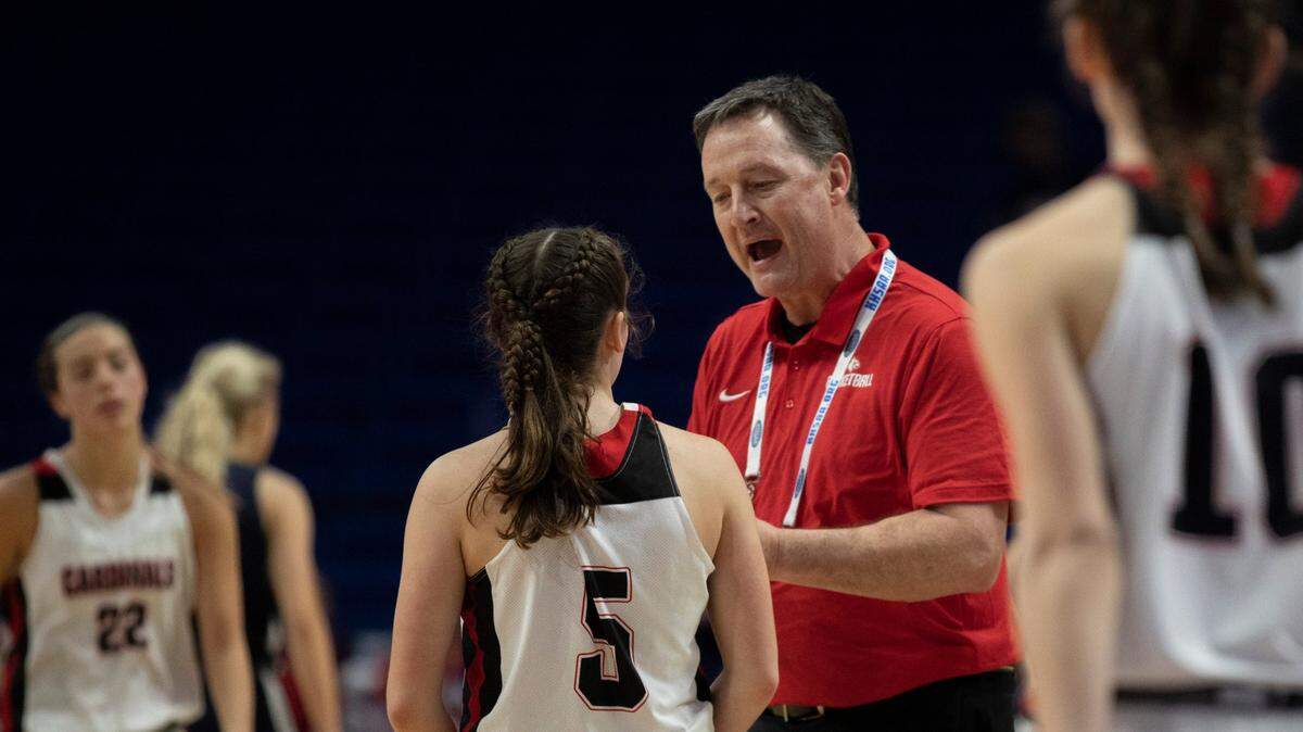 South Laurel coach Chris Souder talks to Brianna Howard during a game against Sacred Heart at last year’s Sweet 16, which was called off mid-tournament because of COVID-19. South Laurel is back for another try this week.