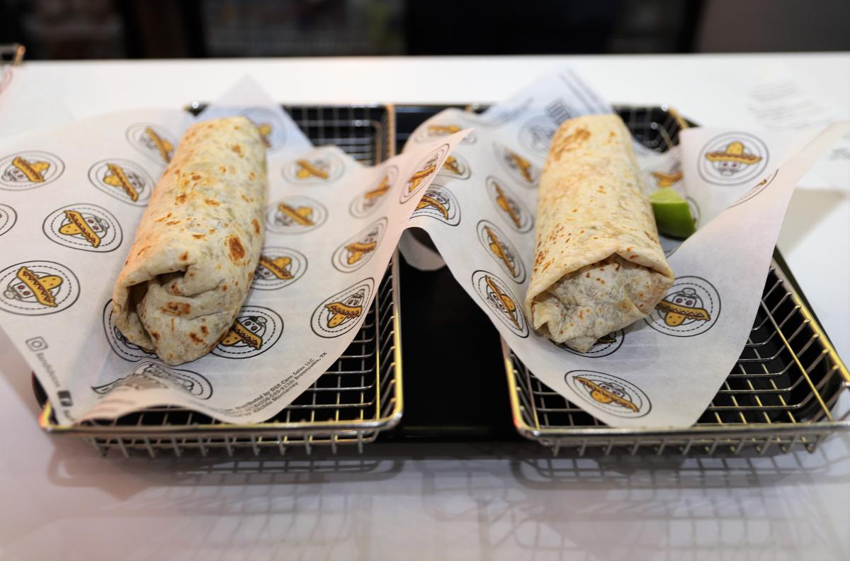 A variety of burritos were served at Bandido Taqueria Mexicana, during the restaurant’s soft opening on Wednesday evening, Sept. 23, 2020. The Southern California-style taqueria officially opens to the public on Sept. 25.