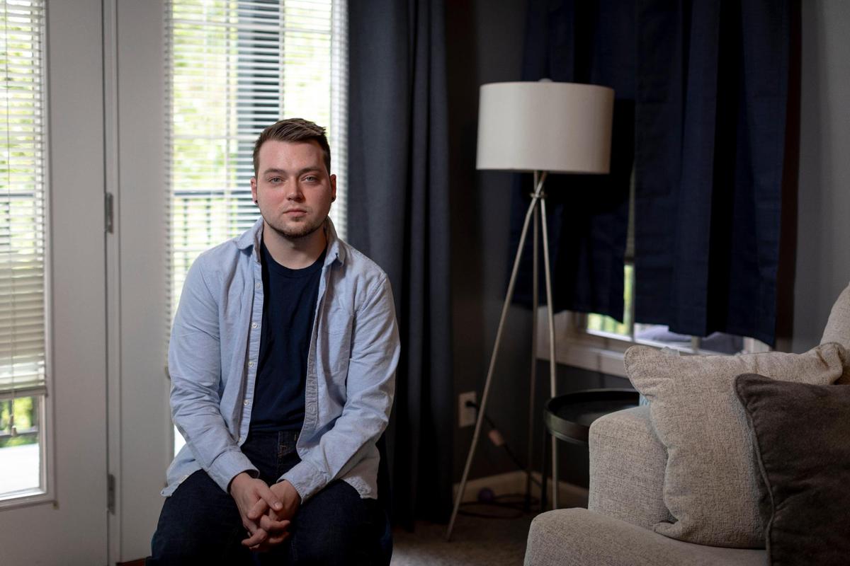 Brandon Ward, Jesse Averitt’s fiance, poses for a photo at his apartment in Lexington, Ky., Thursday, May 13, 2021. Ward was with Averitt at their home when gunmen fired into their house from outside. “I think they need to do something for the safety of everybody,” Ward said.