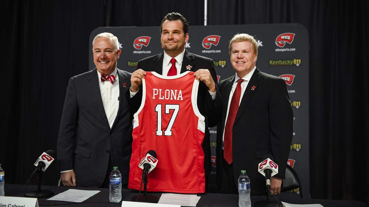 Hank Plona, center, is the 17th men’s basketball head coach in Western Kentucky history. Plona was an assistant coach at WKU last season and previously was the head coach for eight seasons at Indian Hills Community College in Iowa.
