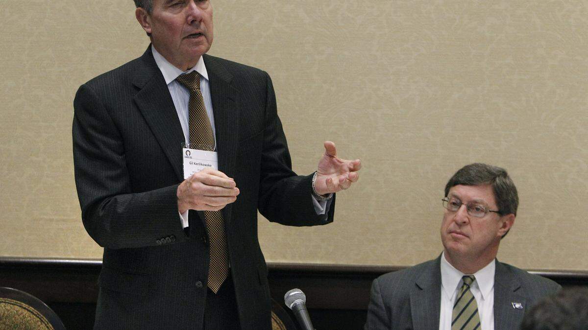 U.S. drug czar Gil Kerlikowske, left, addressed the group as U.S. Congressman Ben Chandler listened on Wednesday, Feb. 23 at the Hilary J. Boone Center on the University of Kentucky campus in Lexington.   The person in charge of drug policy in the U.S., Gil Kerlikowske, is touring Kentucky this week to help bring attention to the nationÕs growing prescription-drug problem, for which Kentucky is ground zero. He sat in on a discussion at UK.  Photo by David Perry | Staff
