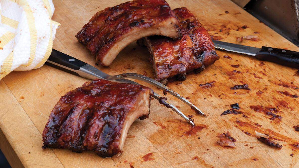 Sur La Table's new barbecue cookbook, Everyday Grilling, includes the recipe for these hickory grilled baby back ribs.   