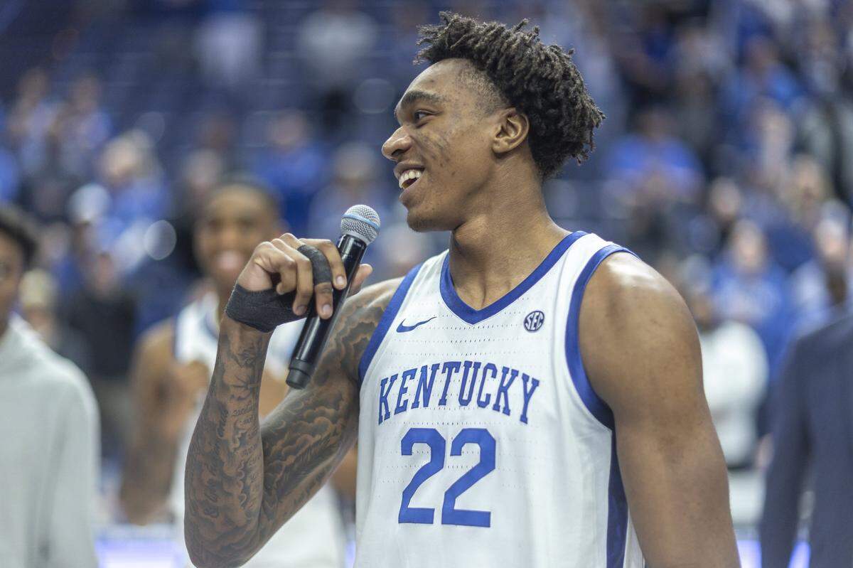 Kentucky center Amari Williams (22) talks to the crowd following Tuesday’s game against LSU at Rupp Arena.