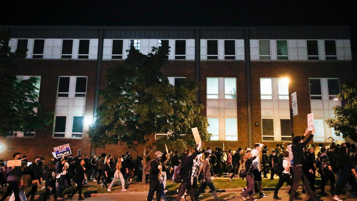 Demonstrators march along South Martin Luther King through UK’s campus during a protest in Lexington following a grand jury’s decision not to indict police officers with any charges directly related to the death of Breonna Taylor. Former Louisville detective Brett Hankison was indicted for wanton endangerment for his role in the shooting.