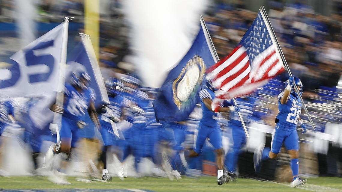 Kentucky’s players ran onto the field ahead of their game against Tennessee on Saturday, Nov. 6, 2021, at Kroger Field in Lexington, Ky.