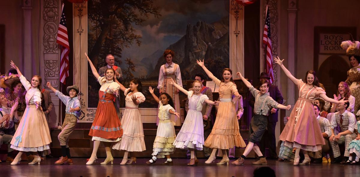 The people of River City celebrating the Fourth of July. The Lexington Theatre Company presents “The Music Man” July 12 to 15 at the Lexington Opera House.