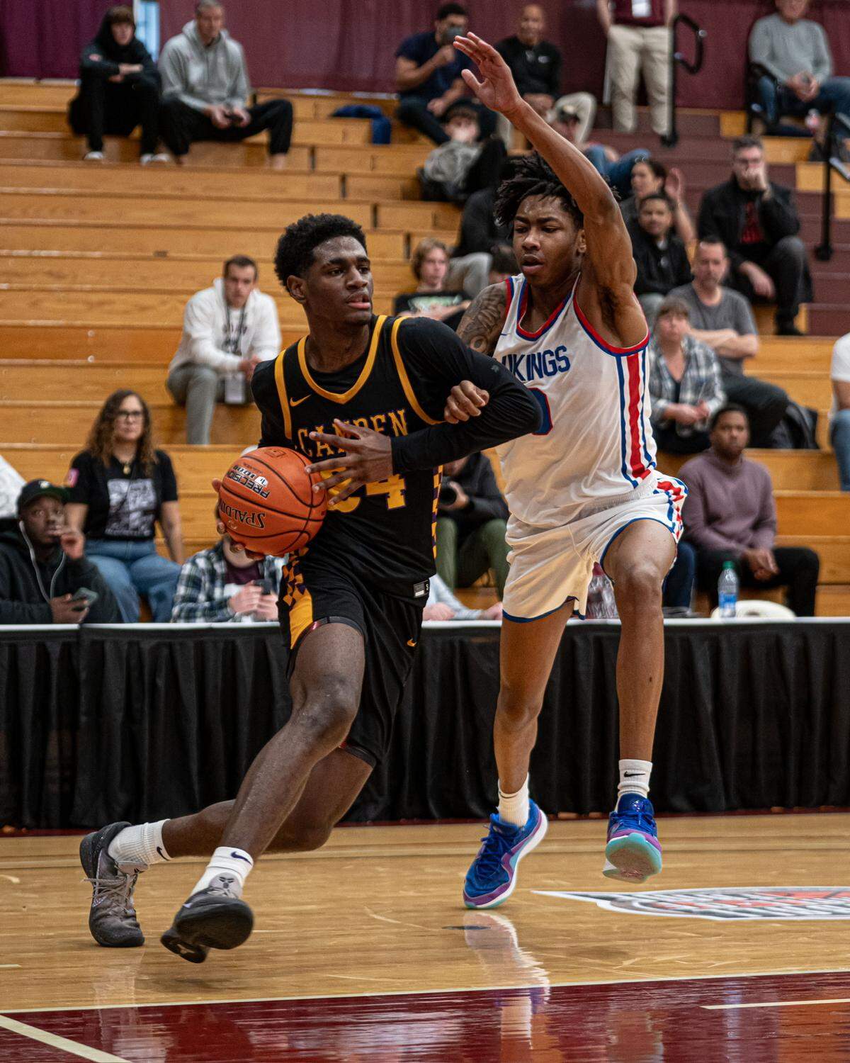 Class of 2024 Kentucky men’s basketball commit Billy Richmond drives to the rim in a game with Camden (New Jersey) High School at the Spalding Hoophall Classic in Springfield, Massachusetts. Richmond is one of five UK men’s basketball commits in the 2024 recruiting class.