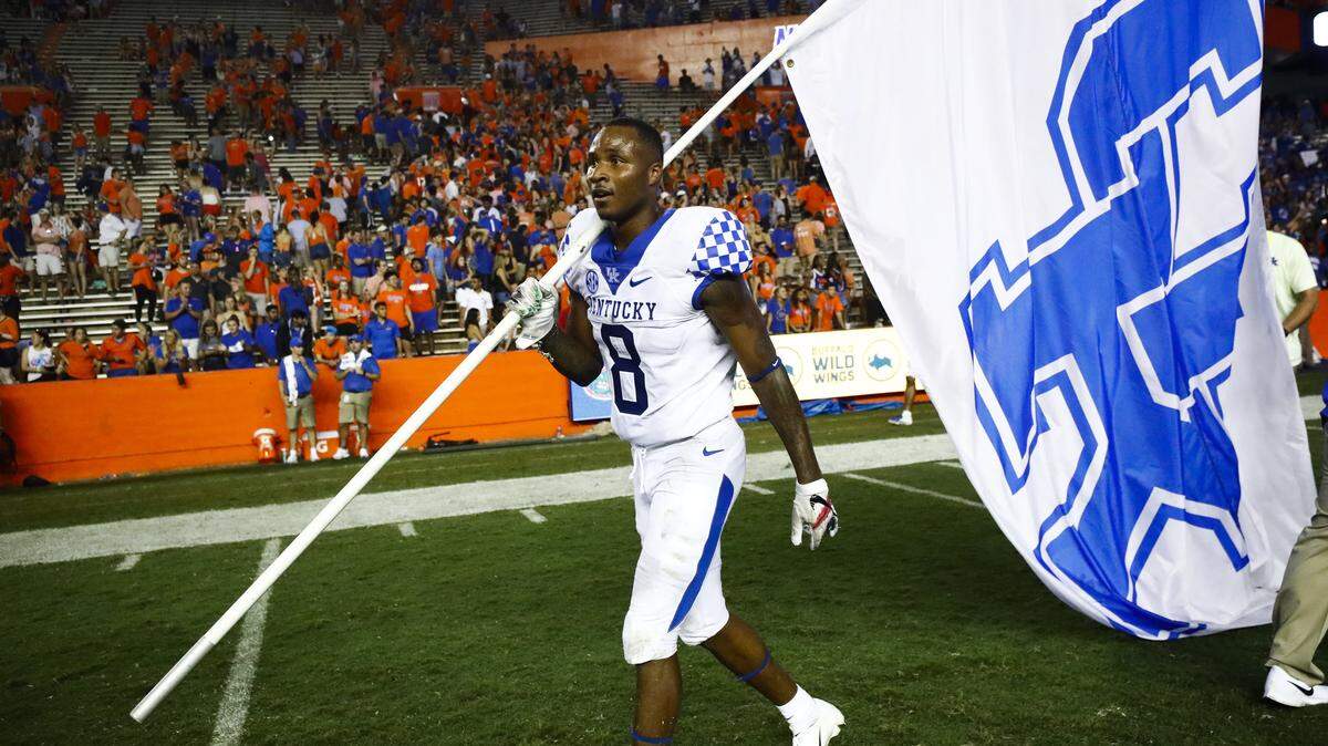 Kentucky cornerback Derrick Baity Jr., a Florida native, carried a flag on the field following the win over the Gators.