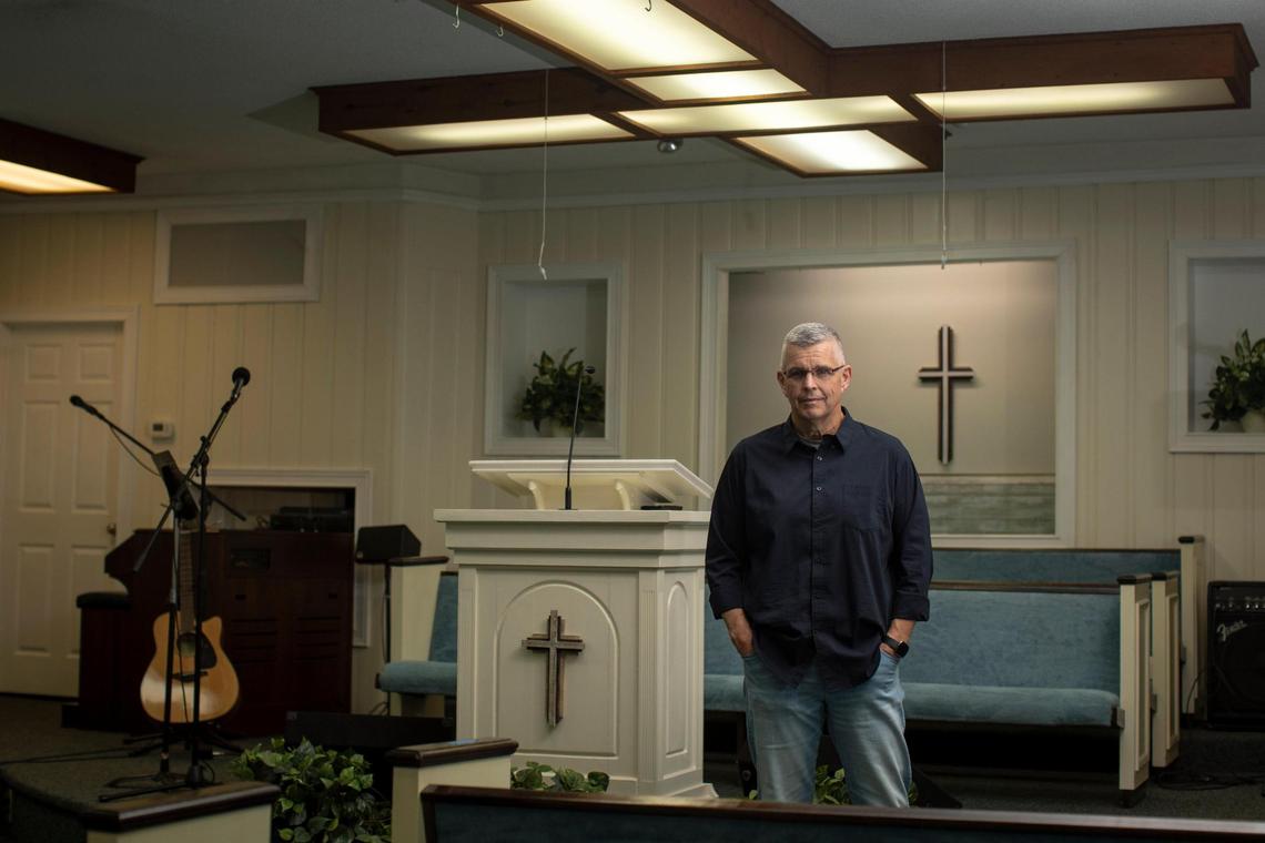 Pastor Buddy Simpson poses for a portrait at the Wallins Church of God in Harlan County, Ky., Friday, April 9, 2021. Simpson got the vaccine and the church has been meeting in their parking lot until recently.