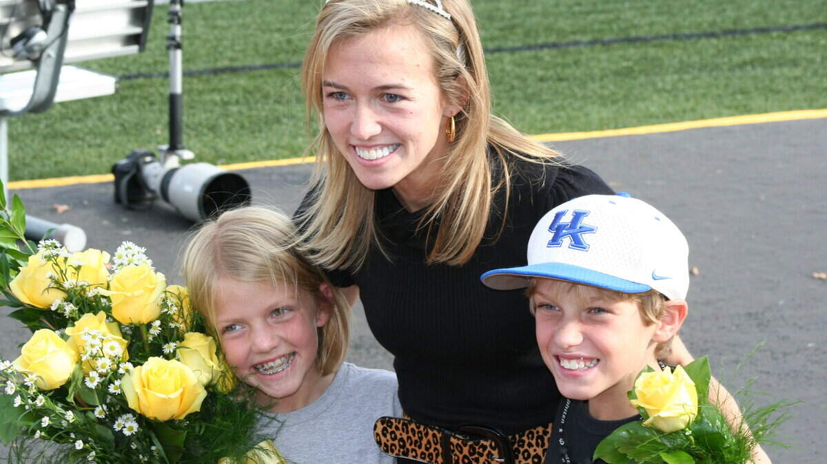 Christina Giles of Versailles, shown with siblings Lilly and Clay, is Centre's homecoming queen.   