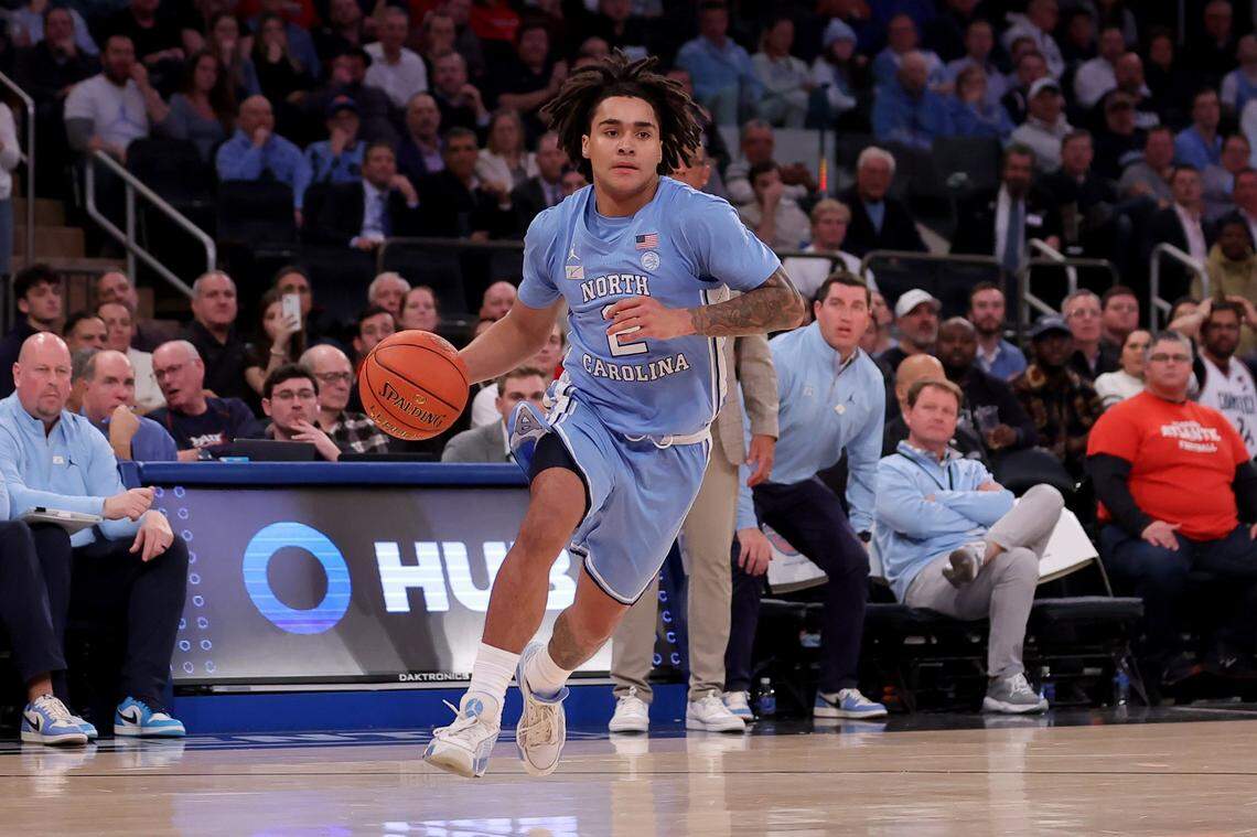Dec 5, 2023; New York, New York, USA; North Carolina Tar Heels guard Elliot Cadeau (2) controls the ball against the Connecticut Huskies during the second half at Madison Square Garden. Mandatory Credit: Brad Penner-USA TODAY Sports
