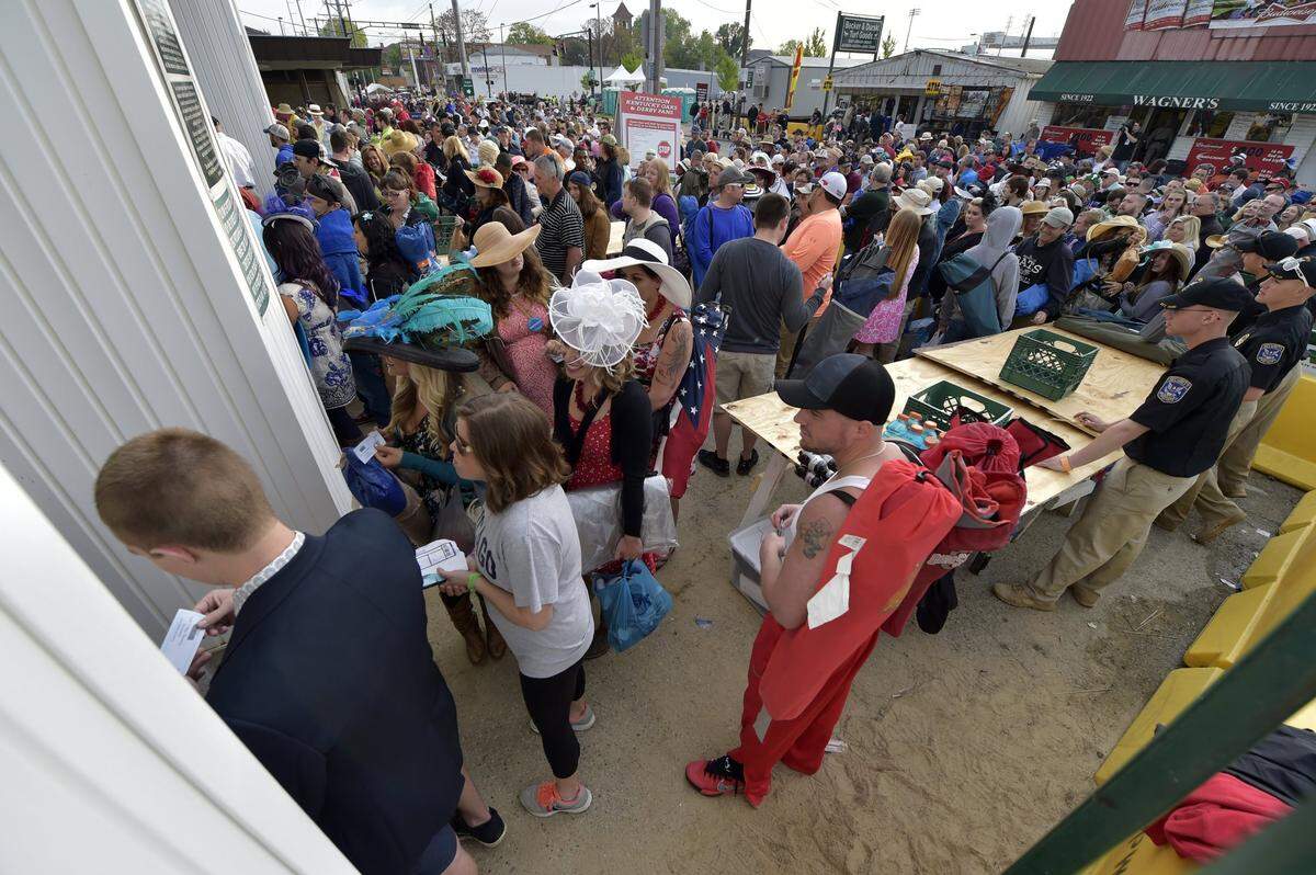Fans enter Churchill Downs on May 2, 2015, for what would become a record-setting attendance number for Kentucky Derby Day: 170,513.