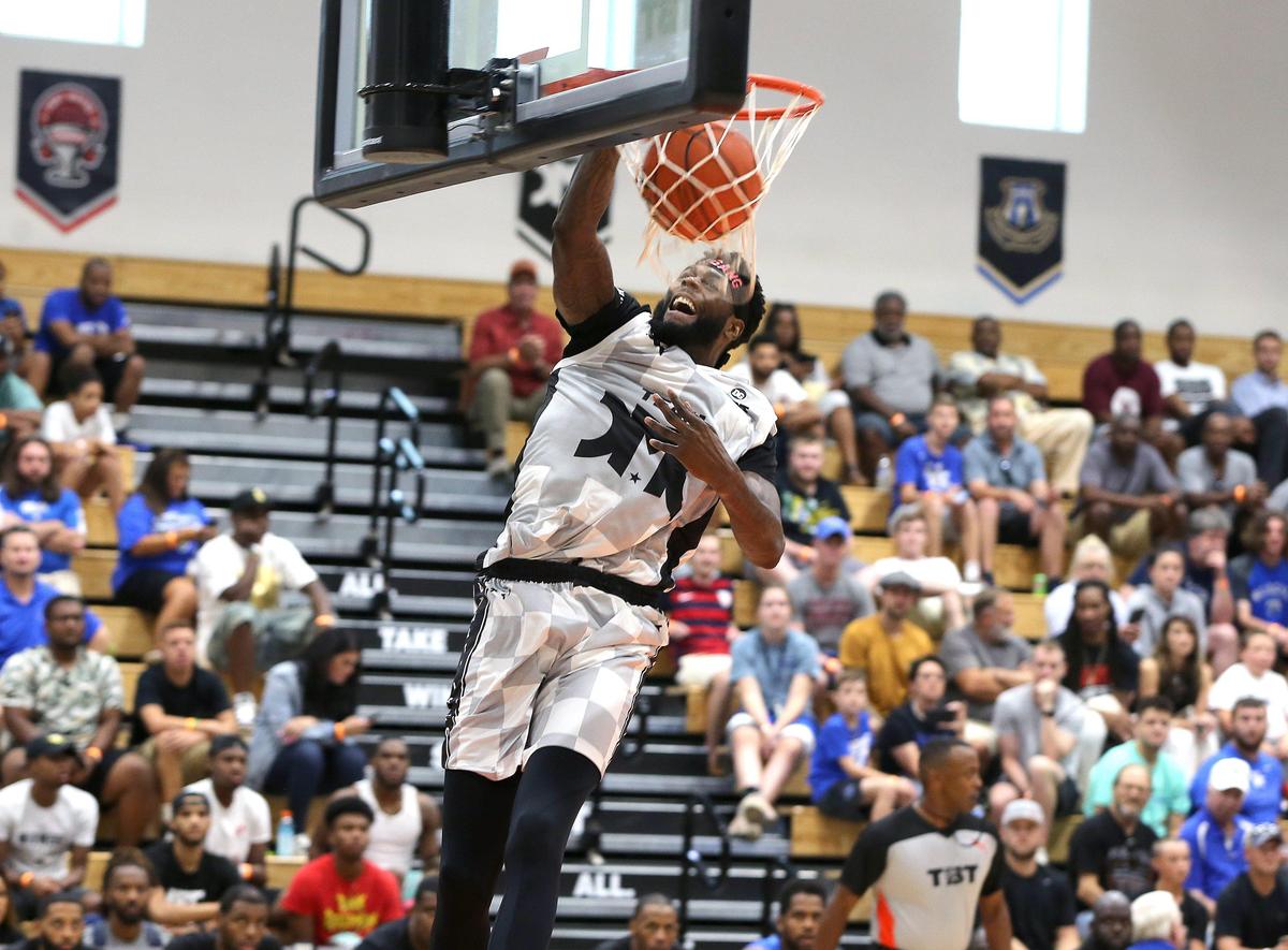 Willie Reed dinked for Love is Loyalty Friday during The Basketball Tournament at Frederick Douglass High School. Photo by Matt Goins