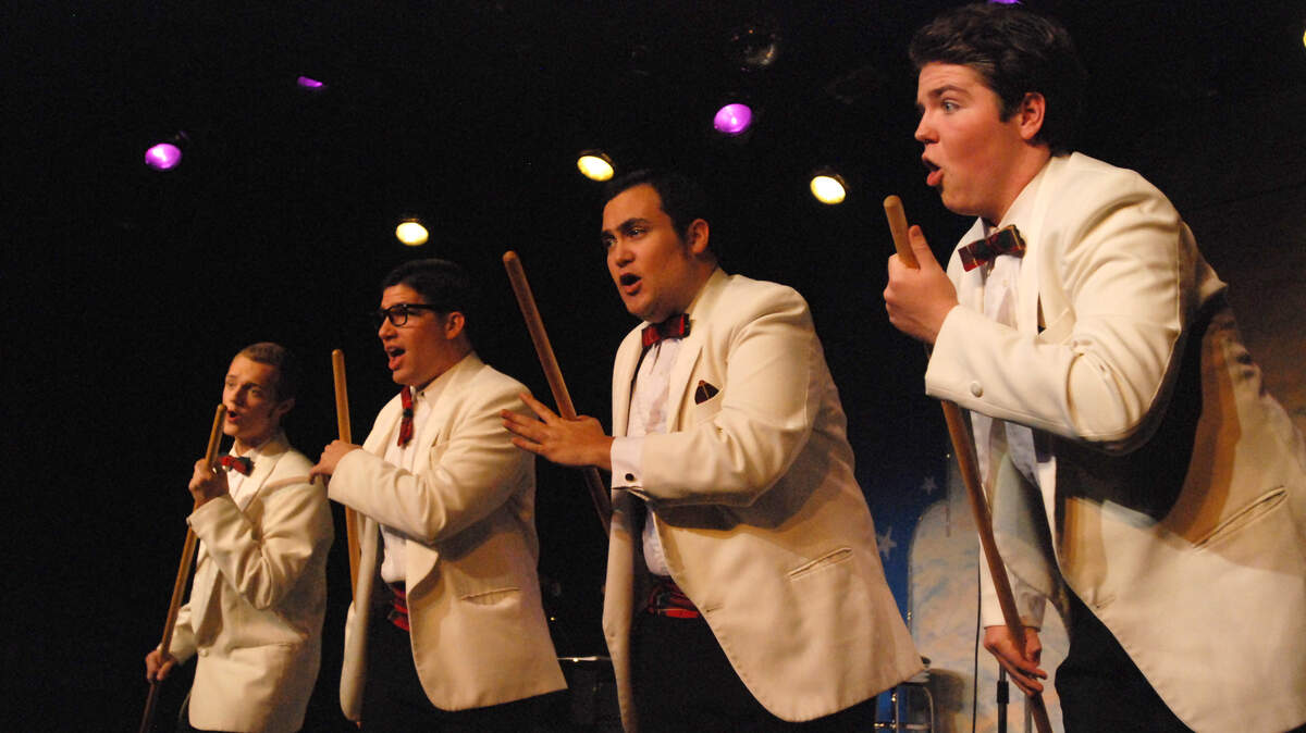 Forever Plaid's Connor Hall, left, Ryan Hornung, Justin Miller and Zack Damron sing Crazy 'Bout Ya Baby, with oversize plungers as they remember rehearsing in a janitor's closet.      