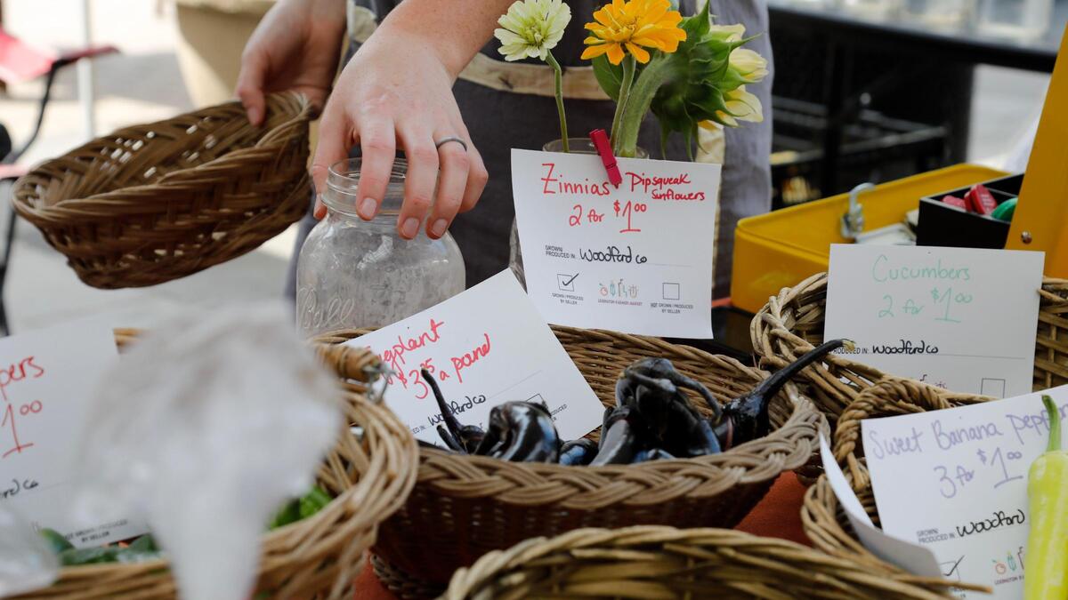 Items from Stonehedge Farm sit in woven baskets on Saturday, June 17, 2023 at the Fifth Third Pavilion in Lexington, Ky.