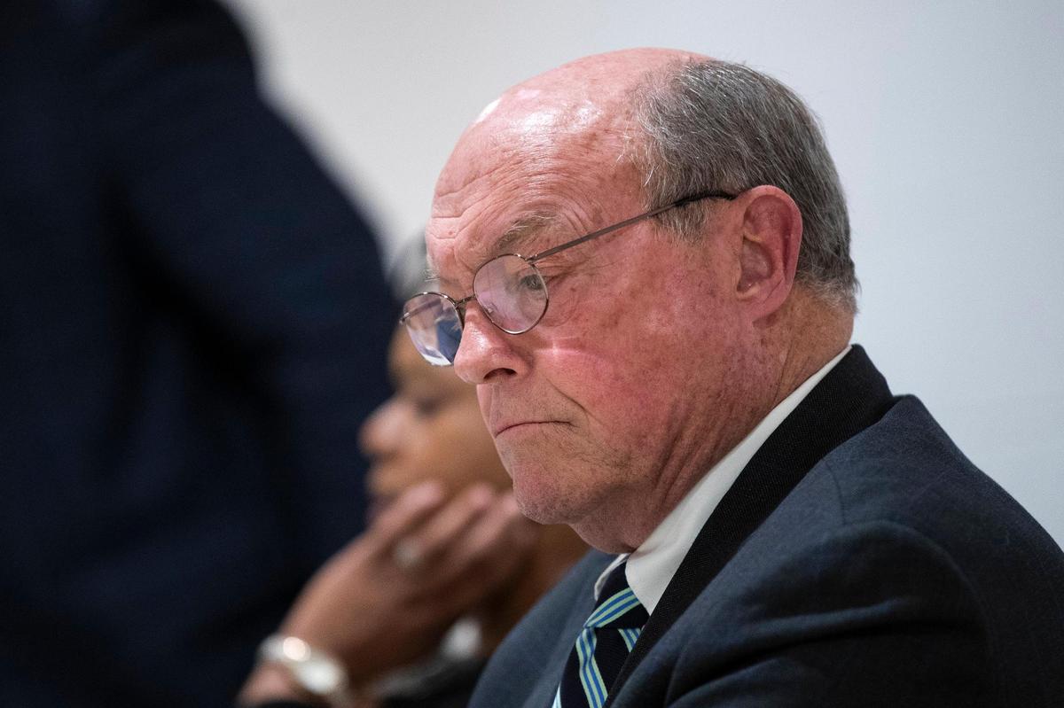 Incumbent Fayette County Attorney Larry Roberts prepares to answer questions during a forum for mayoral and county attorney candidates at the Lyric Theatre in Lexington, Ky., Thursday, April 21, 2022.