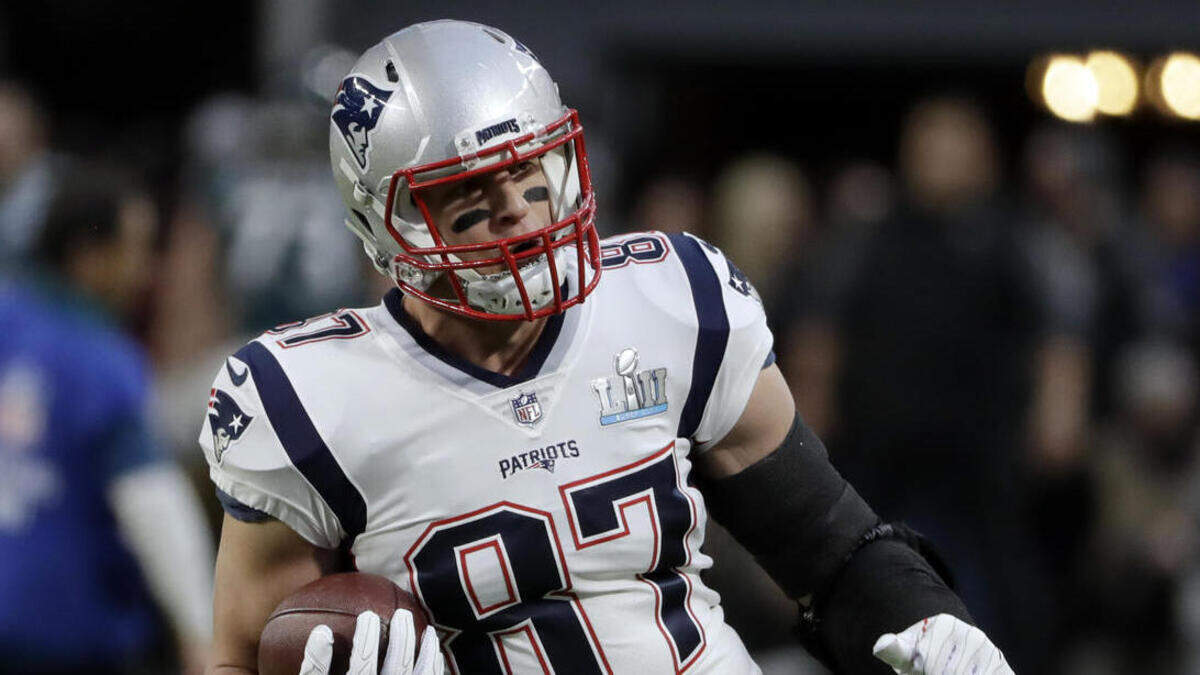 New England Patriots tight end Rob Gronkowski (87), warms up before the Super Bowl against the Philadelphia Eagles, Sunday, Feb. 4, 2018, in Minneapolis. The NFL star has purchased a share of a horse named after him for this year's Kentucky Derby.