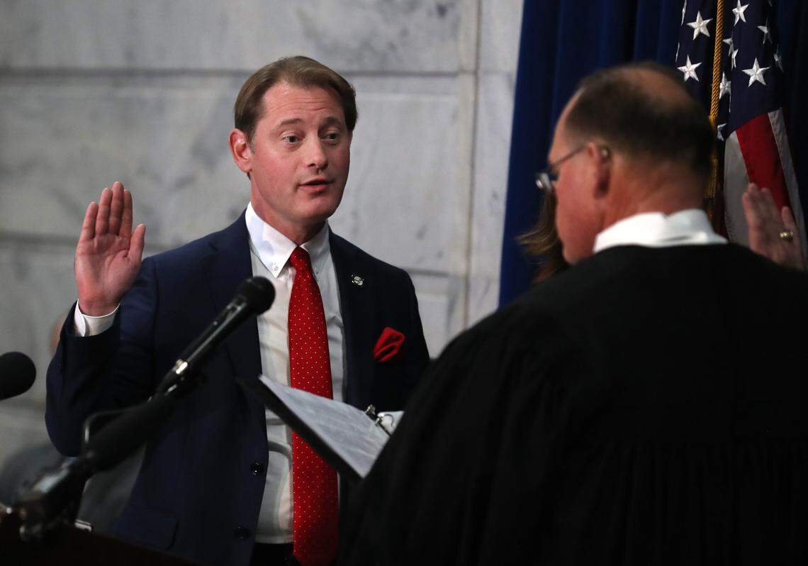 Secretary of State Michael Adams is sworn in by Honorable Christopher Shea Nickell, Justice Supreme Court of Kentucky, at the Swearing-In Ceremony of the Constitutional Officers at the Kentucky Capitol.Jan. 2, 2024