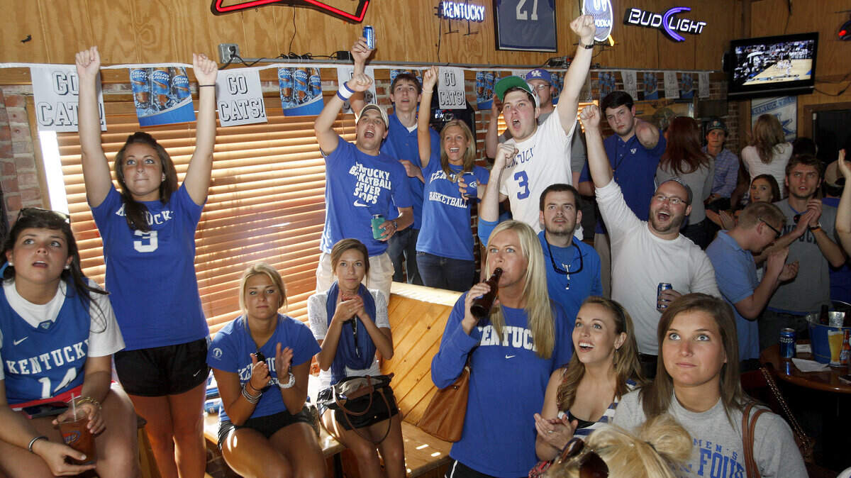 Fans react as UK played Baylor to earn a trip to the Final Four at Two Keys Tavern in Lexington, Ky., Sun., March 25, 2012. Photo by Matt Goins 13711