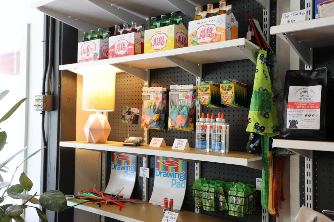 A playful children’s corner provides school supplies and refreshments for local kids at Wilson’s Grocery on May 23, 2024, in Lexington, Ky.