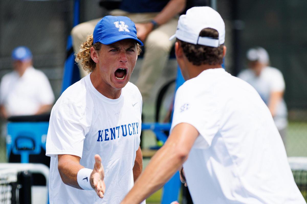 Kentucky’s Liam Draxl celebrates winning a point in his doubles match against Wake Forest on Saturday.