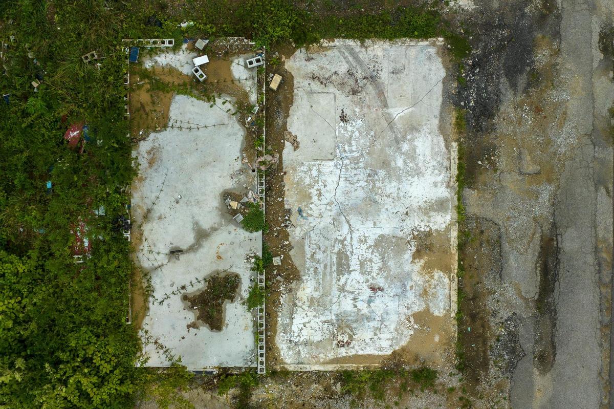A year later looking at the same lot, much of the debris has been cleaned up – but no new home has been built on the property.