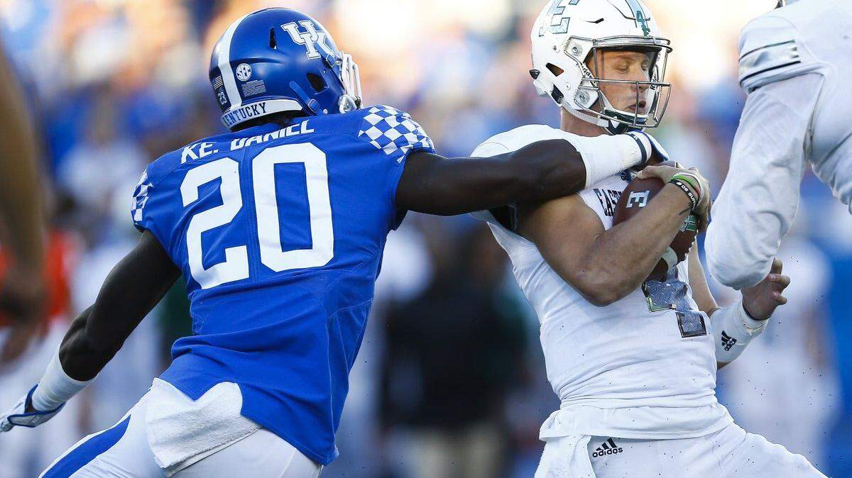 Kentucky's Kengera Daniel tackled Eastern Michigan's Brogan Roback.