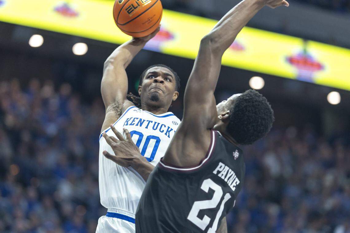 Kentucky guard Otega Oweh (00) looks to shoot the ball as Texas A&M forward Pharrel Payne (21) defends during Tuesday’s game at Rupp Arena.
