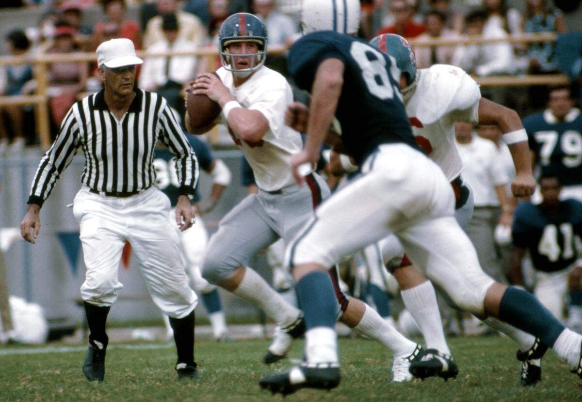 Mississippi quarterback Archie Manning (18) threw for 177 yards and two touchdowns to lead the No. 5 Rebels to a 20-17 win over Kentucky in Jackson, Mississippi, in 1970.