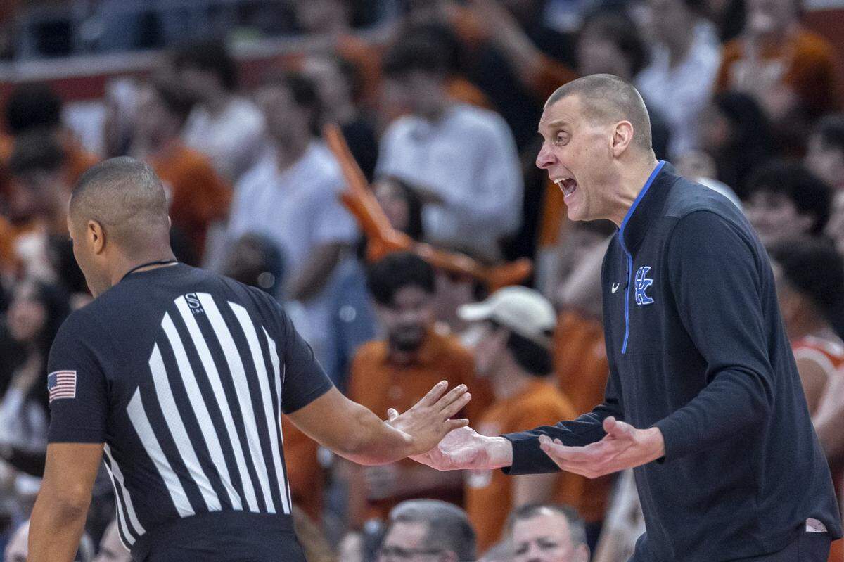 Kentucky head coach Mark Pope talks to an official during a game against Texas at the Moody Center in Austin on Feb. 15.