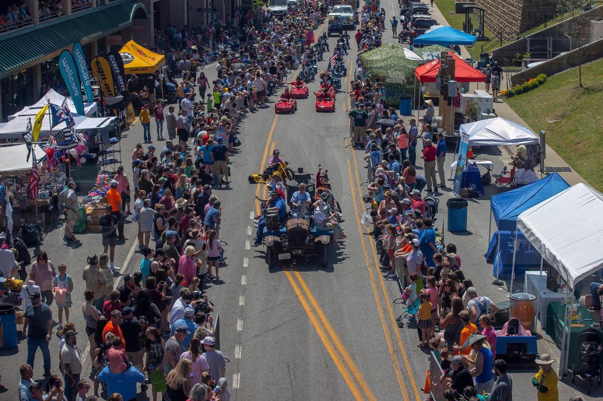Spectators line Hambley Boulevard as the Hillbilly Parade makes its way through downtown Pikeville, Ky., during Hillbilly Days on Saturday, April 23, 2022. This marked the first time the event was held since 2019.