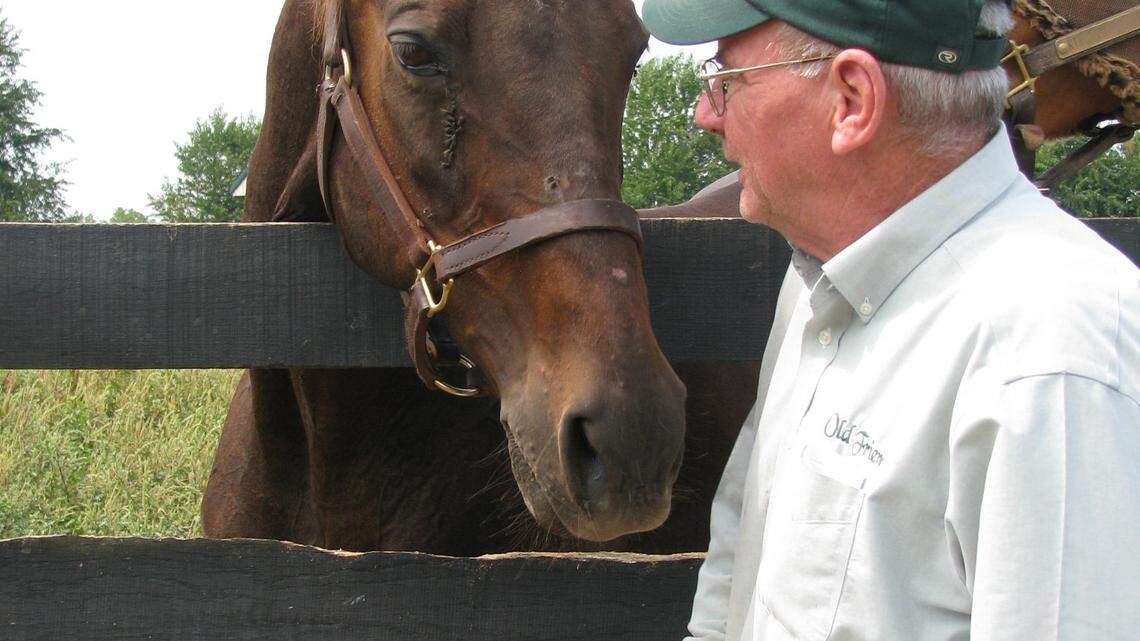 Michael Blowen, founder and president of Old Friends in Scott County, feeds carrots to Zippy Chippy on Wednesday, July 18, 2012. The horse is on loan to the Scott County center through the month of August. Photo by Greg Kocher | Staff

gkocher1@herald-leader.com