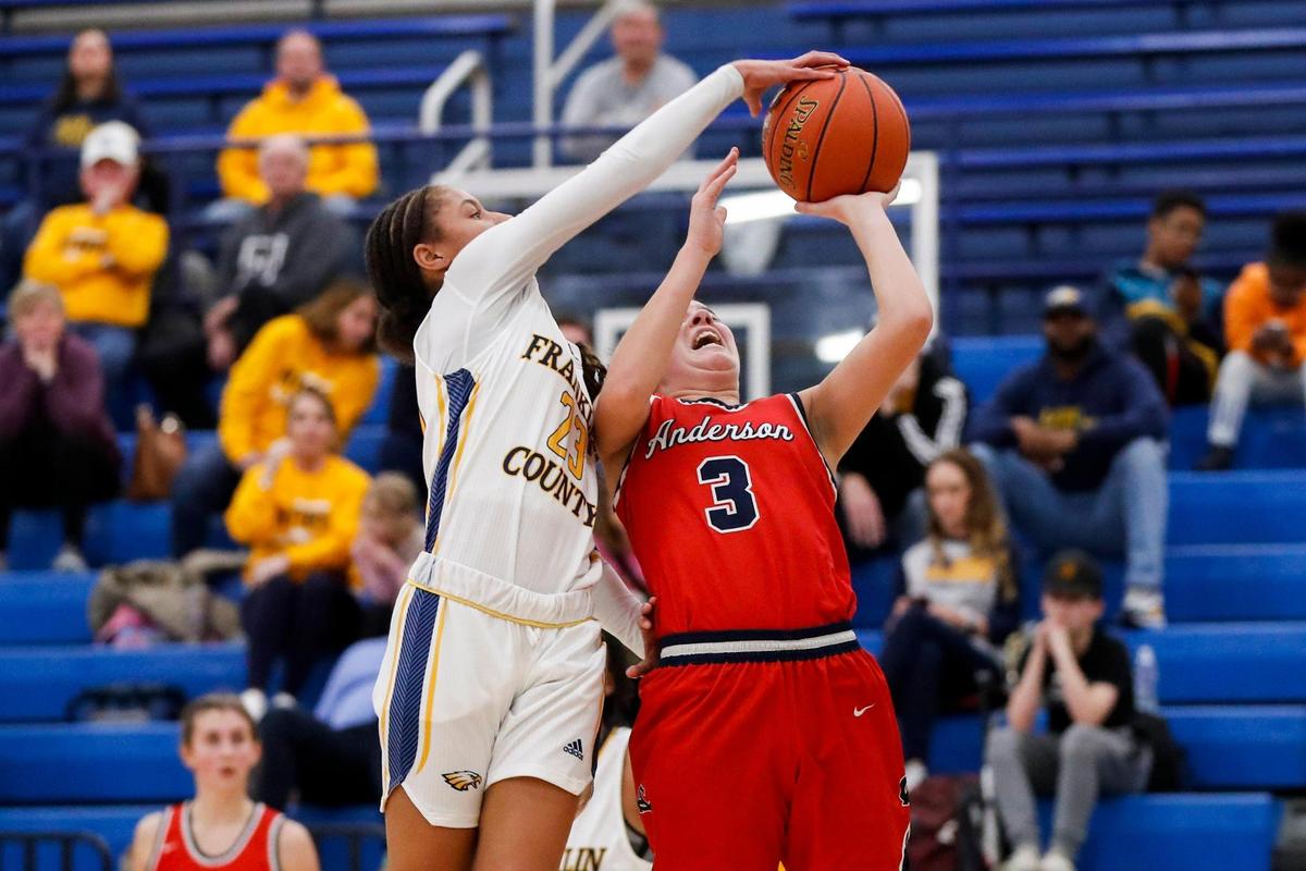 Franklin County’s Logan Kennedy, left, blocks a shot by Anderson County’s Jenna Satterly during Thursday’s game in Frankfort.