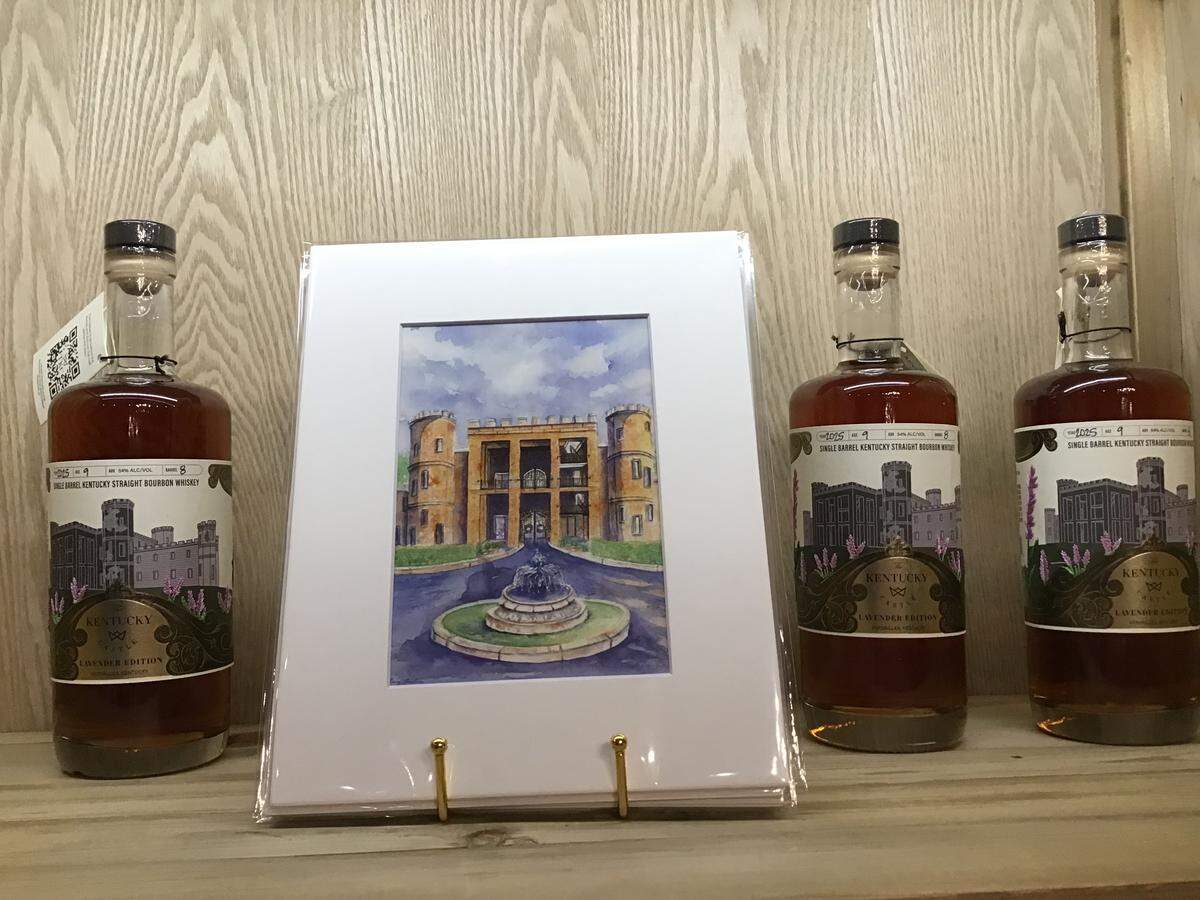 The Kentucky Castle Bourbon, along with a print of the building, for sale in the castle gift shop in Versailles.