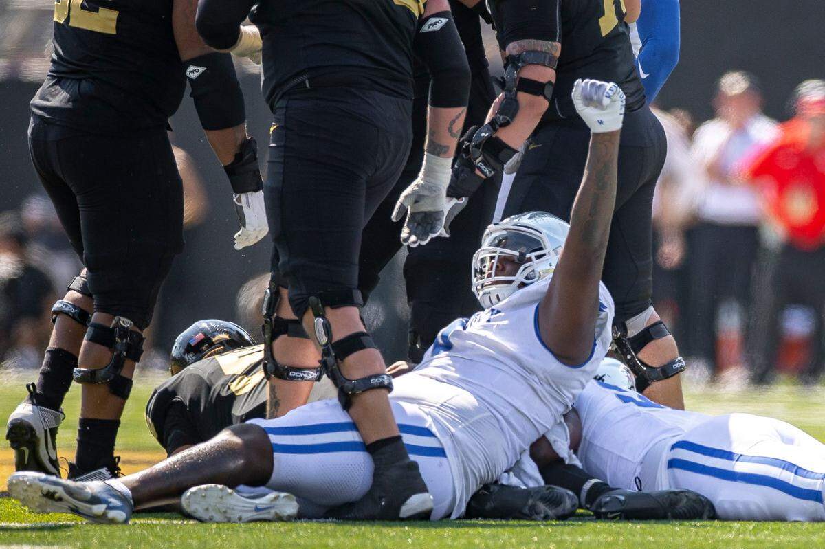 Kentucky defensive lineman Deone Walker cheers after helping make a stop against Vanderbilt at FirstBank Stadium in Nashville on Saturday.