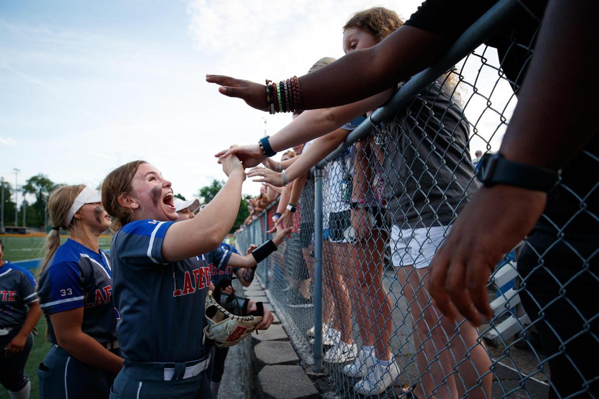 Lafayette’s Trinity Bridges (14) celebrates with fans following the Generals’ 2-1 win over Lexington Catholic in the 43rd District championship on Wednesday.