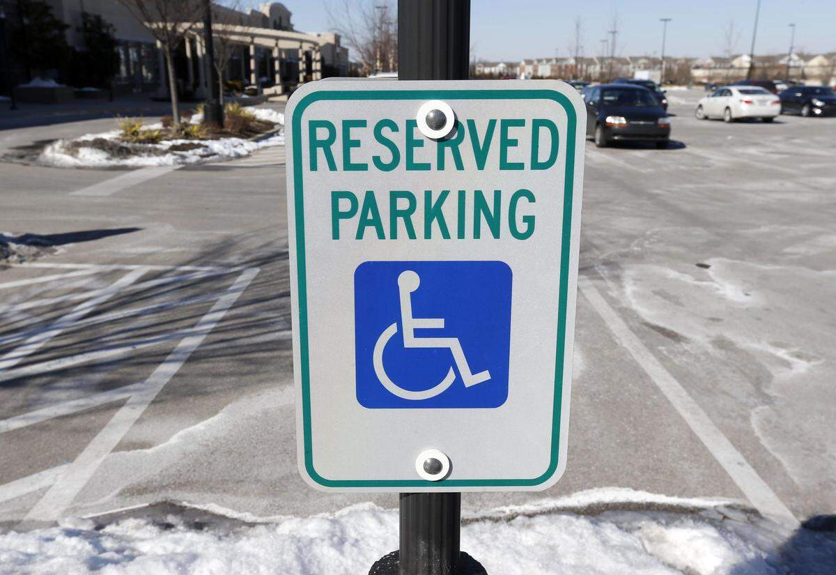 Handicap parking spots in Lexington, Ky., Wednesday, January 29, 2014. Photo by Charles Bertram Staff