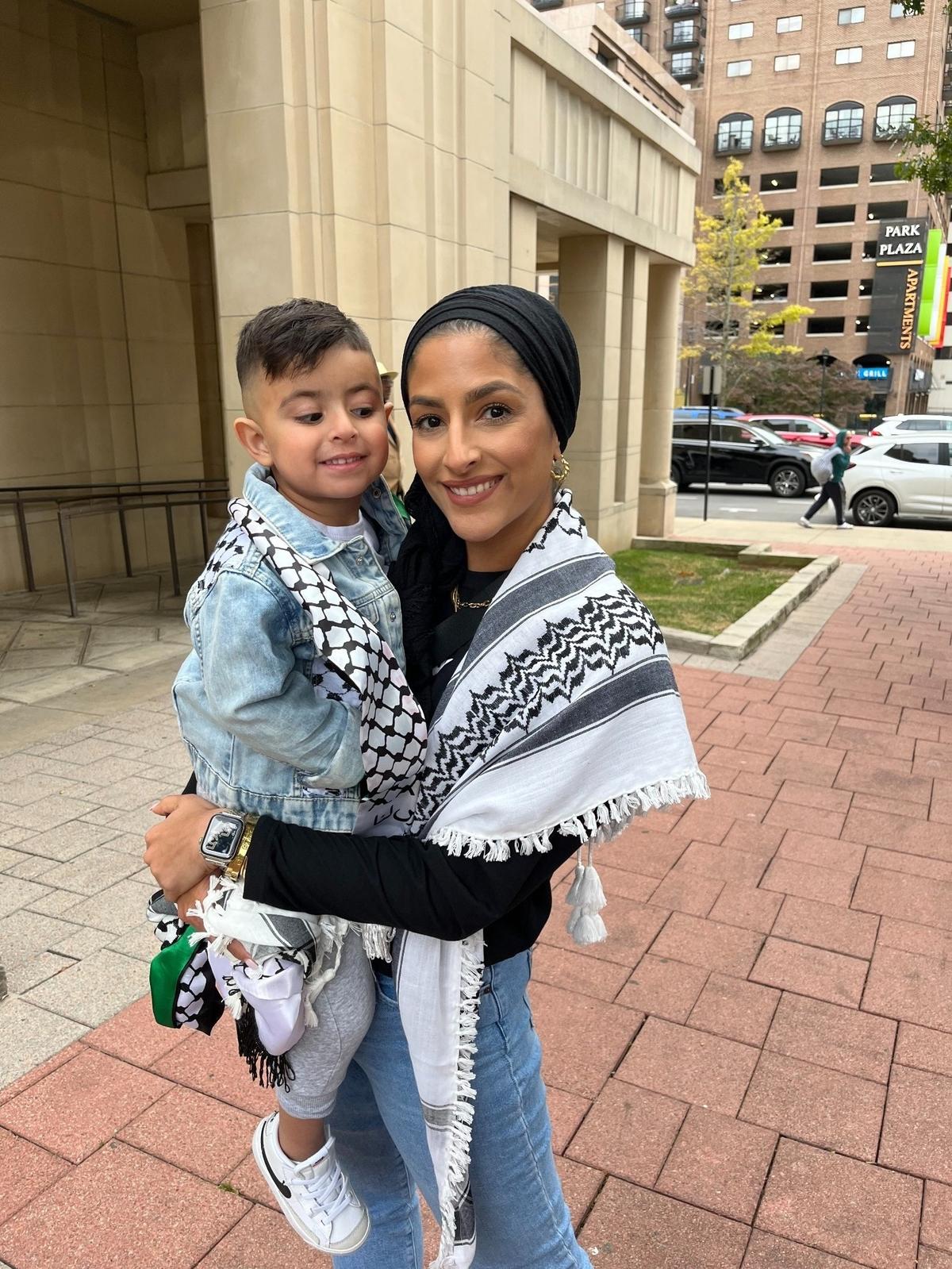 Summer Shalash and her son, Dean, attended the rally for Gaza at Lexington’s courthouse square on Oct. 17, 2023.
