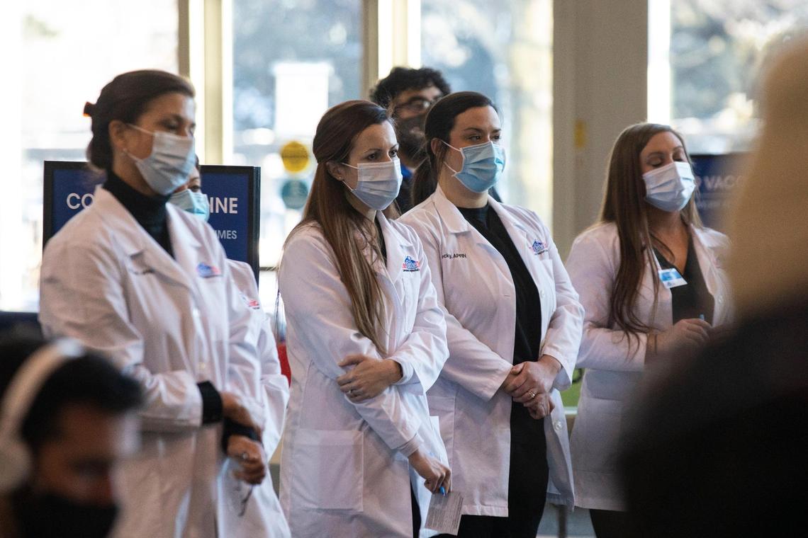 Health professionals prepared for the first patients at the new high-volume regional vaccination center at the Horse Park in Lexington Tuesday.